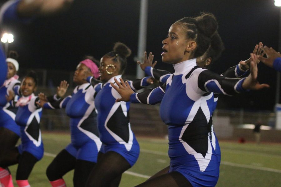 The Major-Steppers performing during a football half time.