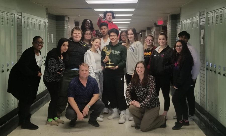 Emmy-award winning editor Tim Mullen poses with WHHS journalism students.