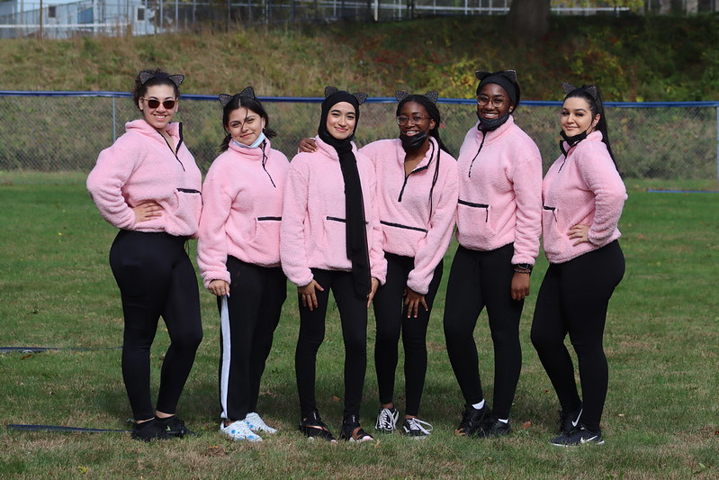 The Pretty Pink Pack team poses at the MDA Field Day