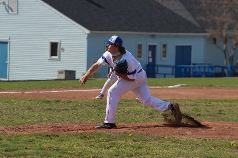 Jake Romano pitching during a game last spring.