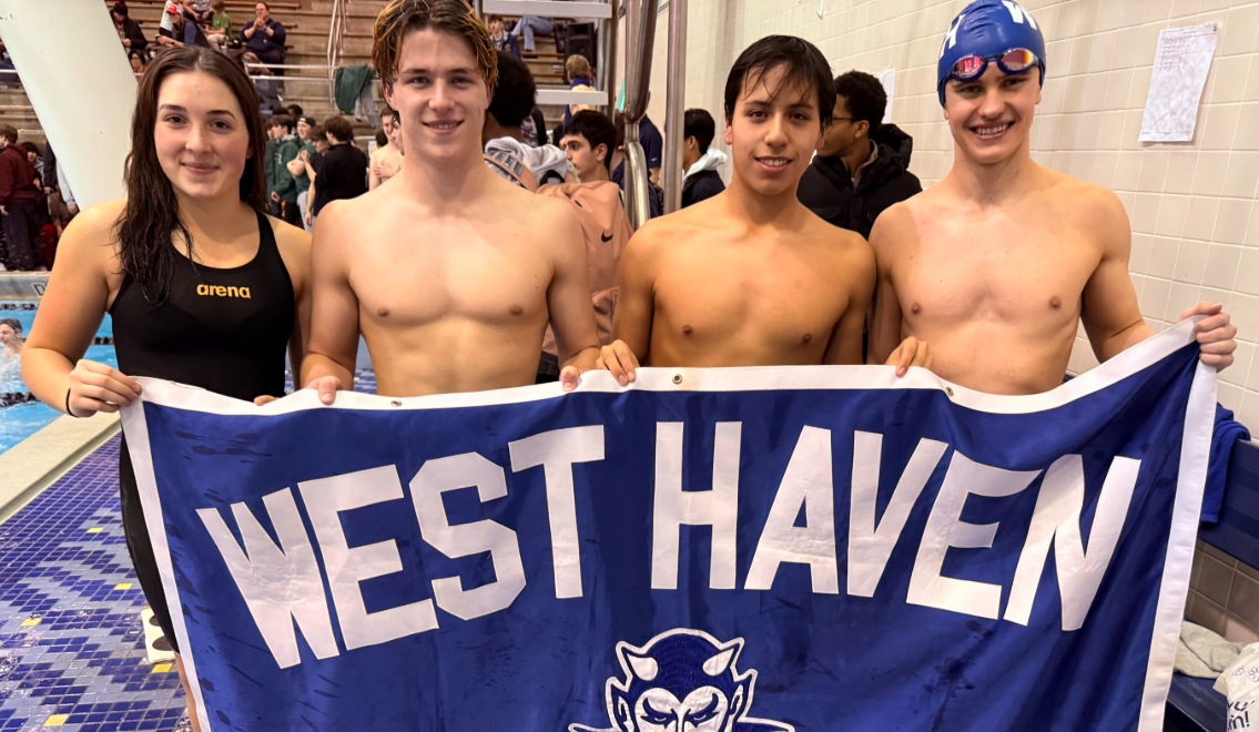 Swim Team Breaks Two School Records